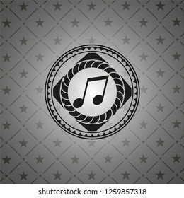 musical note icon inside dark badge or emblem