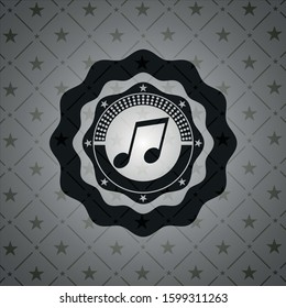 musical note icon inside dark badge or emblem