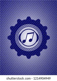 musical note icon inside denim background