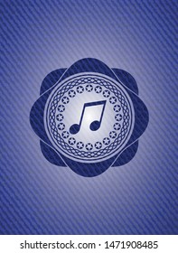 musical note icon inside denim background