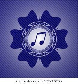 musical note icon inside emblem with denim high quality background