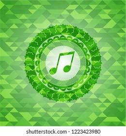 musical note icon inside realistic green emblem. Mosaic background