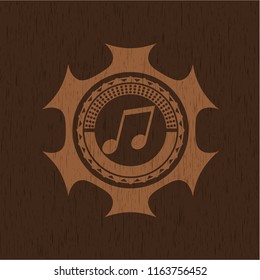 musical note icon inside retro style wood emblem