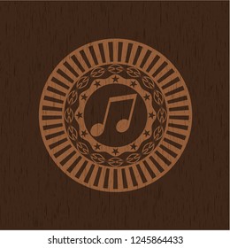 musical note icon inside retro wood emblem