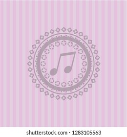 musical note icon inside retro style pink emblem