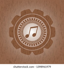 musical note icon inside retro wood emblem