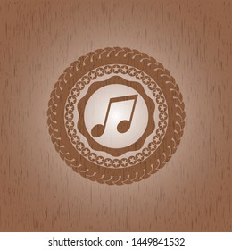 musical note icon inside retro style wooden emblem