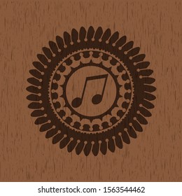 musical note icon inside retro style wood emblem