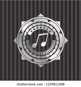 musical note icon inside silver emblem or badge