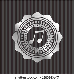 musical note icon inside silvery badge