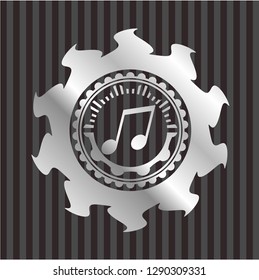 musical note icon inside silvery badge
