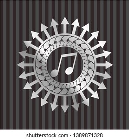 musical note icon inside silvery badge