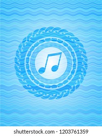 musical note icon inside sky blue water wave badge background.