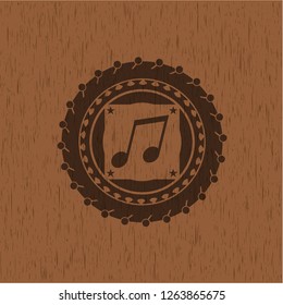 musical note icon inside vintage wood emblem