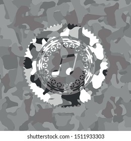 musical note icon on grey camouflaged pattern