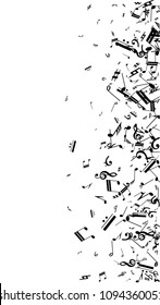 Musical Notes on White Background.  Vertical Orientation. Many Random Falling Notes, Bass and Treble Clef. Vector Musical Symbols.  Jazz Background. Abstract Black and White Vector Background.