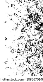 Musical Notes on White Background.  Vertical Orientation. Many Random Falling Bass, Treble Clef and Notes. Vector Musical Symbols.  Jazz Background. Abstract Black and White Vector Background.