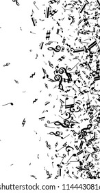 Musical Notes on White Background.  Vertical Orientation. Many Random Falling Notes, Bass and Treble Clef. Vector Musical Symbols.  Abstract White and Black Vector Background. Jazz Background. 