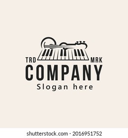 musical piano and guitar musical instrument logo design