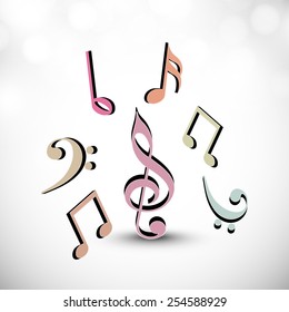 Musical symbols on shiny grey background.