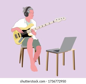 The musician man playing bass guitar with laptop, wearing headphone relaxing at home. The new normal life style, the outbreak of the coronavirus covid 19, people working and  communication at home. 