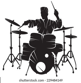 The musician playing drum setting. Vector silhouette