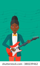 Musician playing electric guitar.