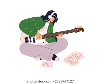 Músico tocando la guitarra eléctrica, componiendo música, sentado en el suelo con hojas de notas. Mujer creativa feliz que crea la melodía en el instrumento de cuerda. Ilustración vectorial plana aislada sobre fondo blanco