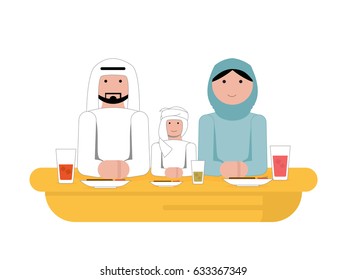 Muslim Arab family breaking gathered on If-tar with delicious traditional food on the table breaking their fast 