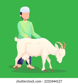 Muslim boy grazing a goat on the lawn