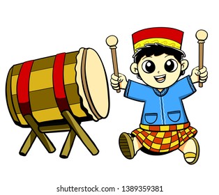 muslim boy playing big drum summon people to pray at ramadhan