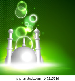 Muslim community festival Eid Mubarak background with mosque on shiny green background. 