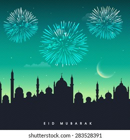 Muslim community festival, Eid Mubarak celebration with mosque silhouette on fireworks decorated night background.