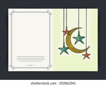 Muslim community festival, Eid Mubarak celebration greeting card decorated by creative hanging stars and moon.