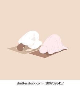 Muslim Couple Praying Together In Sujud Position In The Prayer Mat