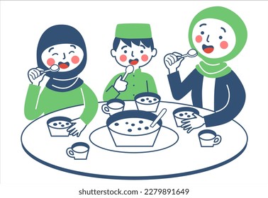 Muslim family is eating together at the dining table