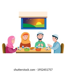 Muslim family of four, parents, one son, and one daughter are seen praying to eat together and get ready to enjoy the iftar meals