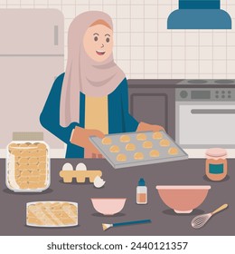 Muslim female baking nastar in the kitchen