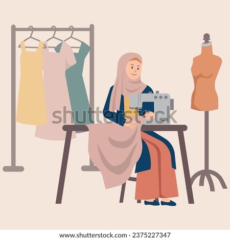 Muslim female sewing with sewing machine