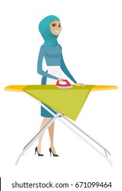 Muslim maid ironing clothes using iron on ironing board after laundry. Full length of young hotel maid ironing clothes on ironing board. Vector flat design illustration isolated on white background.
