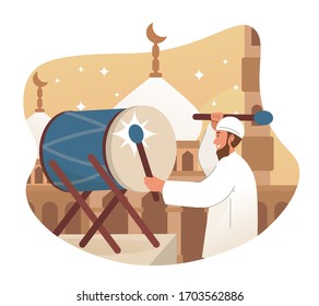 Muslim man hits drum prior to the azan (call to prayer)