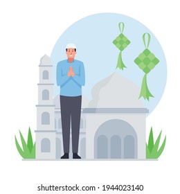 Muslim man stand and greeting for eid al fitr.