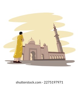 Muslim man walking to mosque to pray