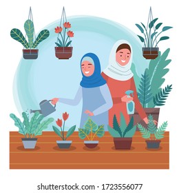 a Muslim mother and daughter with hijab are watering and caring for plants together happily.