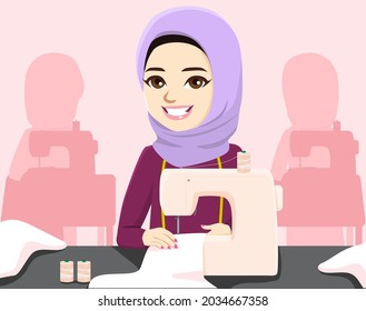 Muslim professional tailor woman working sewing clothes with sewing machine on workshop