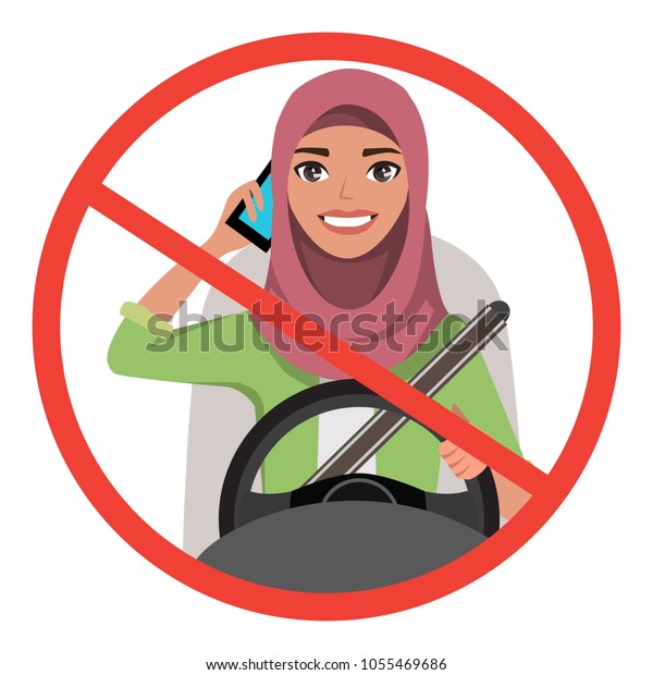 Muslim woman driving a car\
talking on the phone. Muslim woman wearing hijab. sign stop\
danger