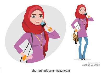 Muslim woman in hijab talking on the phone.