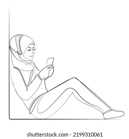 Muslim woman in hijab uses smartphone line art drawing,vector illustration.Young modern muslim woman looks into her smartphone phone while sitting on the floor continuous line drawing.Minimal design