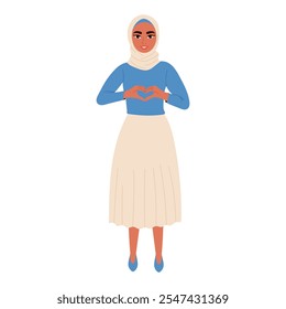 Muslim woman making heart shape with her fingers. Concept for Valentine's day.