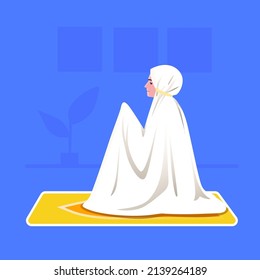 a Muslim woman praying in sajdah